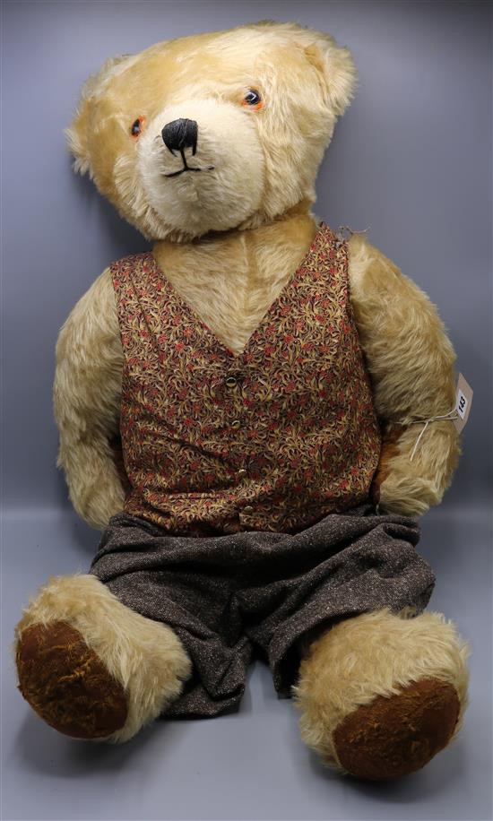 A large blonde mohair teddy bear